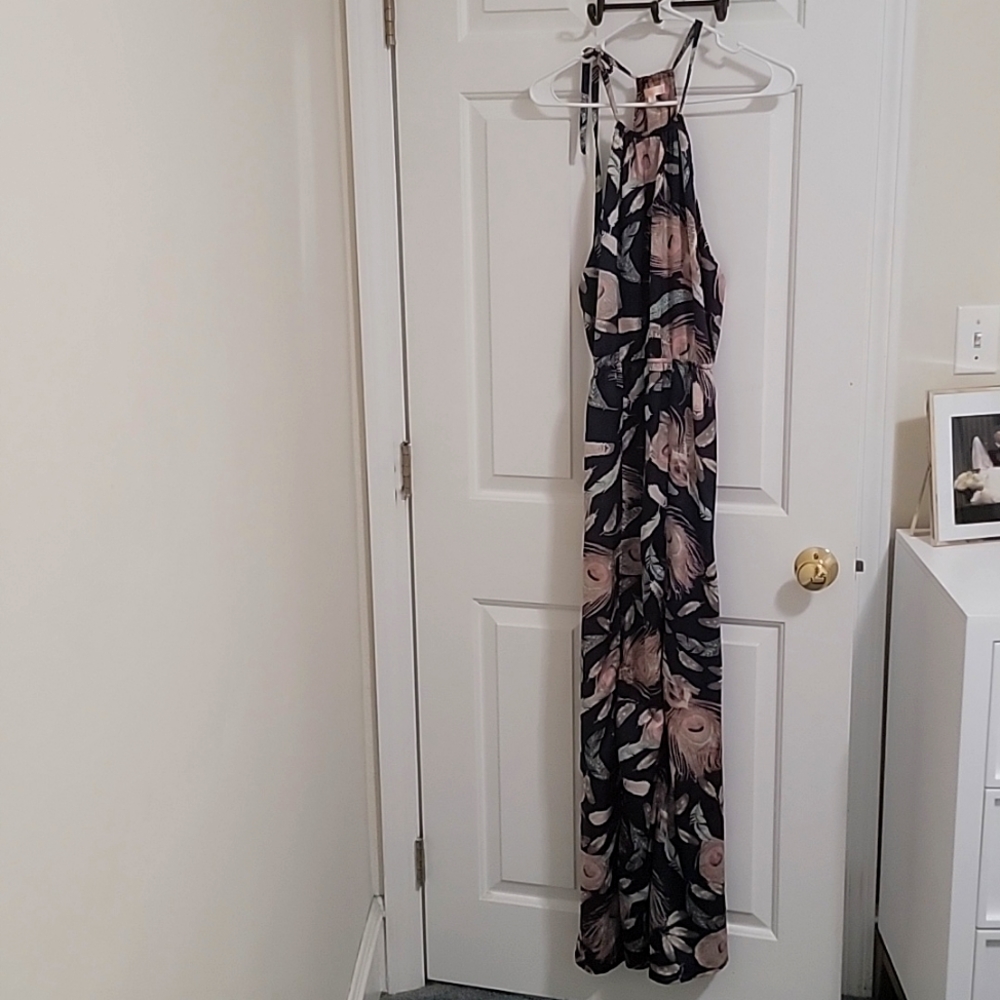 maxi sleevless dress with 2 slits in the front portion of skirt
